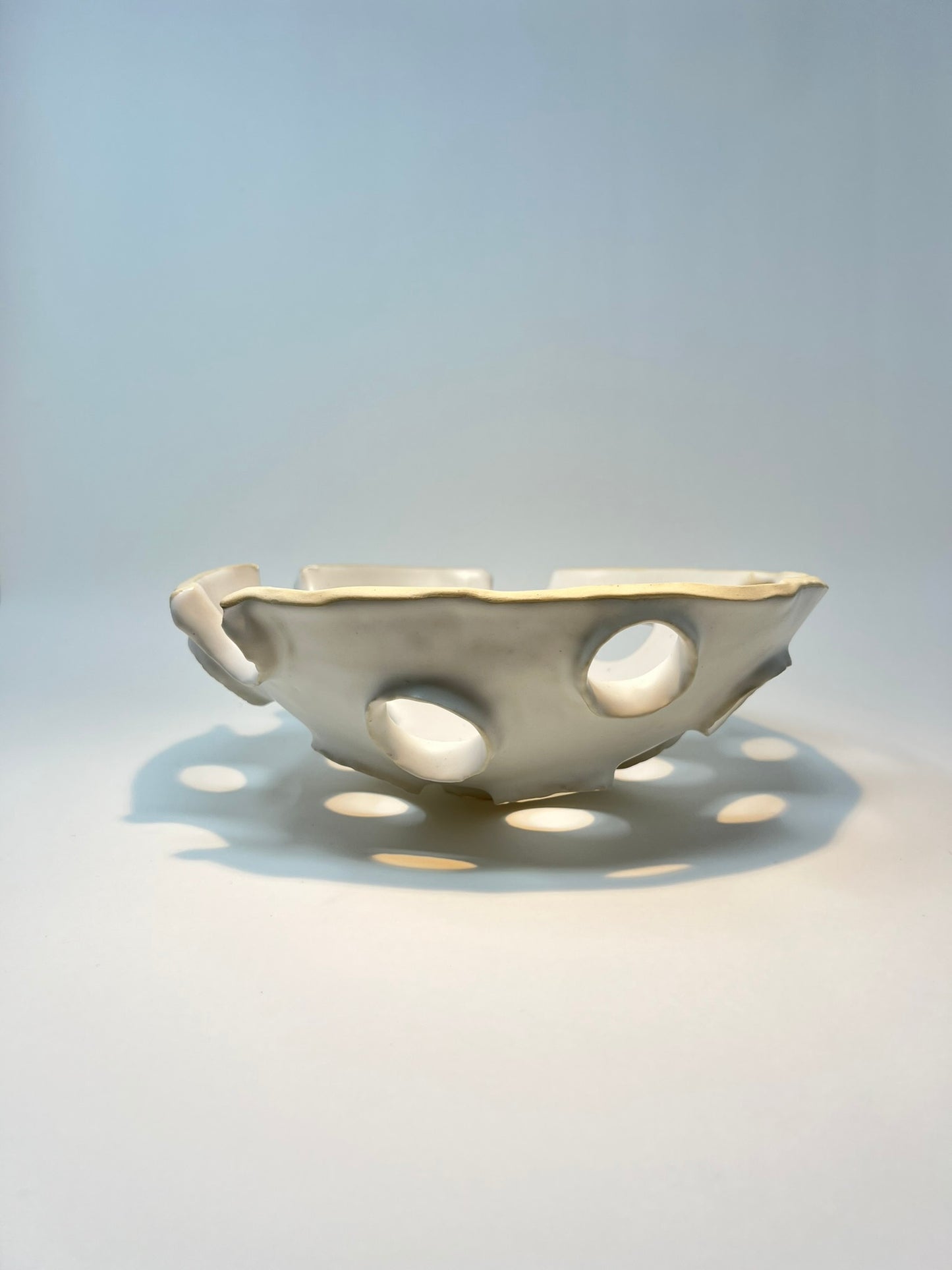 Studio LQ - Large bowl with hand-pitched circle cutouts
