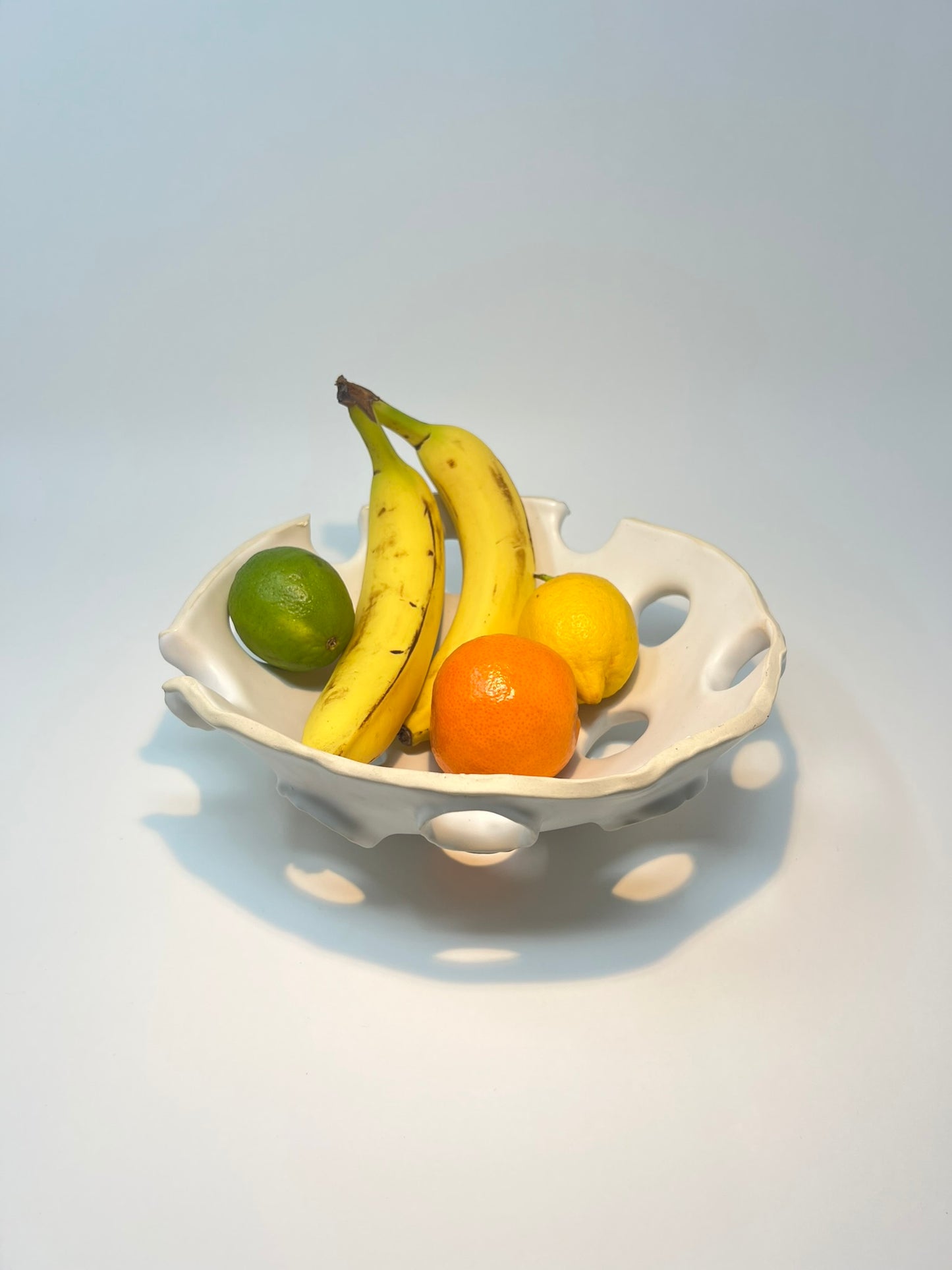 Studio LQ - Large bowl with hand-pitched circle cutouts